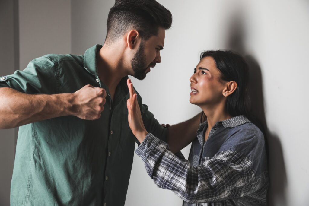 Domestic violence - Couple fighting and male about to beat his couple - Engel & Martin, LLC